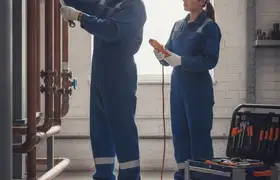 Scottsdale, AZ plumber repairing a home pipe for reliable plumbing service